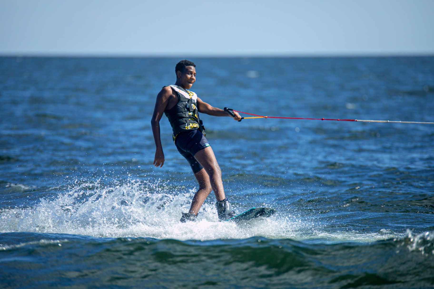 One-handed wakeboarding