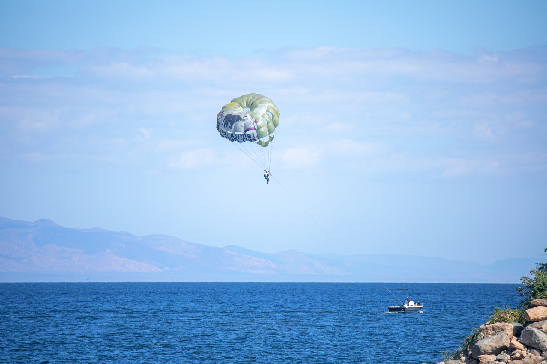 Paragliding with tow boat